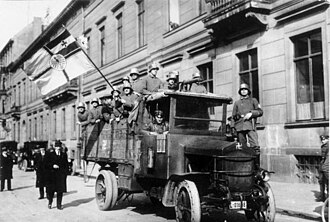 The Marinebrigade Ehrhardt during the Kapp Putsch in Berlin, 1920[149] The Marinebrigade Erhardt used the swastika as its symbol, as seen on their helmets and on the truck, which inspired the Nazi Party to adopt it as the movement's symbol.