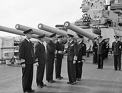 King George VI and Admiral Sir Bruce Fraser aboard HMS Duke of York at Scapa Flow, August 1943. The King is wearing the uniform of an admiral of the fleet.