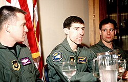 Captain Scott F. O'Grady (centre), whose F-16 Fighting Falcon was shot down over Bosnia on 2 June 1995, while he was flying in support of Operation Deny Flight.