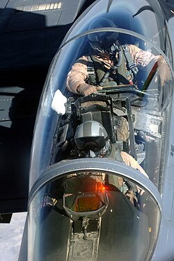 A view of an F-15E cockpit from an aerial refueling tanker.