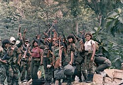 A group of Contras in the former Zelaya Department on Nicaragua's west coast on the Caribbean Sea. Women commonly joined the Contras as combatants.[113]