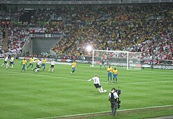 Beckham takes the free kick against Brazil from which John Terry scored.