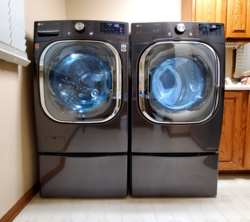 LG washer and dryer on pedestals