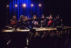 González performing with chamber pop group yMusic in 2016