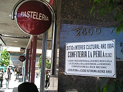 A municipal plaque commemorates the importance of the La Perla del Once café in the development of Argentine rock