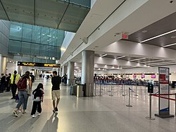 Check-in counters at the South Terminal of the airport.