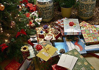 Christmas gifts under a Christmas tree