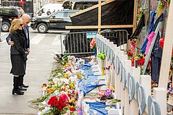 Then-President Biden and then-first lady Jill Biden pay their respects at a memorial to the victims on Bourbon Street, January 6, 2025