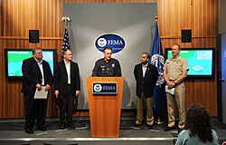 Federal Emergency Management Agency (FEMA) Administrator David Paulison (center) with various United States' federal officials and other response leaders on August 30.