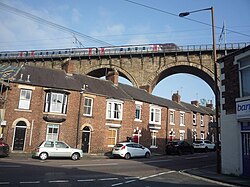 Terraced houses beneath the railway viaduct in Durham, now largely occupied by student renters