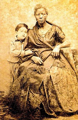 A young boy with an enslaved woman, Brazil, 1860.