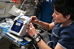 SpaceX Crew-4 astronaut Samantha Cristoforetti operating the rHEALTH ONE on the ISS during a technology demonstration