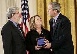 Lucas receiving the National Medal of Technology and Innovation from President George W. Bush, February 2006