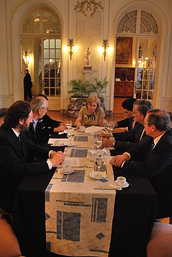 Uruguayan officials conversing at a meeting at the Palacio Taranco, 6 November 2010