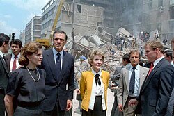 First ladies Paloma Cordero of Mexico (left) and Nancy Reagan of the United States (right) with U.S. Ambassador to Mexico, John Gavin observing the damage done by the 1985 earthquake