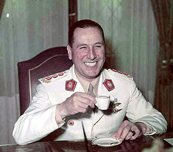 Lt. General Perón in military uniform, drinking coffee (1950 or later)