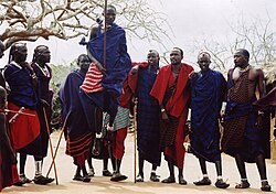 Maasai wearing traditional clothes named Matavuvale while performing Adumu, a traditional dance