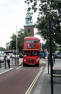 Bus Gate with a red-and-white pole lifted to admit a Routemaster bus, City of London, 2007