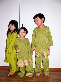 Malay children wearing traditional dress during Eid al-Fitr