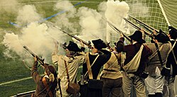 The End Zone Militia firing flintlock muskets following a New England goal during a match against Chicago in 2013.