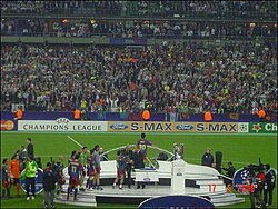 The Barcelona players receiving their medals