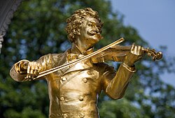 A monument of Johann Strauss II in the Stadtpark