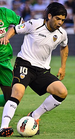Banega in action for Valencia in 2011