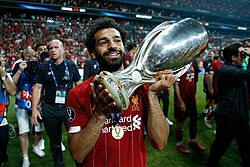 Salah with the UEFA Super Cup trophy in 2019