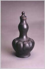 An ebony-coloured Labu Sayong, a classic Malay jar from Kuala Kangsar, Perak, Malaysia