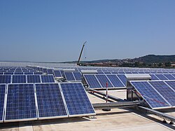 Solar panels in Piombino, Tuscany. Italy is one of the world's largest producers of renewable energy.[229]