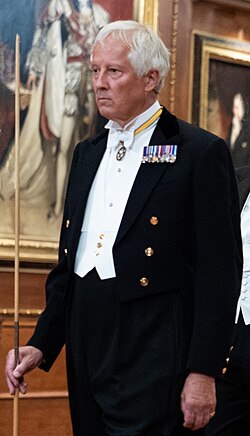 The Earl of Rosslyn wearing his badge as a Baronet of Nova Scotia.