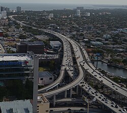 The southern terminus of I-95 in Greater Downtown Miami. In the background, the roadway lowers to surface level at which point it merges with US 1.