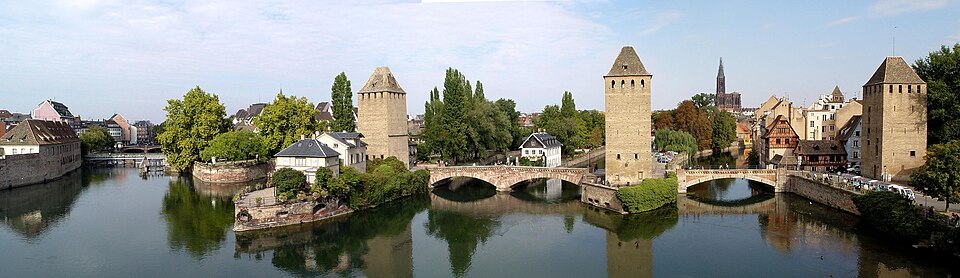 Panorama from the Barrage Vauban with the medieval bridge Ponts Couverts in the foreground (the fourth tower is hidden by trees at the left) and the cathedral in the distance on the right
