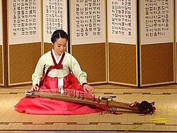 A musician playing a gayageum