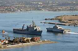 USS Coronado (LCS-4) (right) passes USS Rushmore
