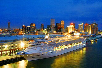 The Port of New Orleans has a cruise terminal that accommodates cruise lines such as Carnival, Norwegian, and ACL. The photograph shows the Norwegian Sun docked at the port.