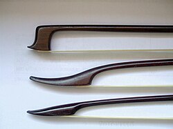 Heads of three violin bows: (upper) transitional (F. Tourte), swan-bill head of a long 18th-century model, pike-head of a 17th-century model