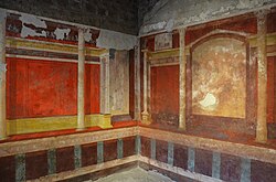 A room featuring various frescos