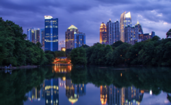 The skyline of Midtown (viewed from Piedmont Park) emerged with the construction of modernist Colony Square in 1972.