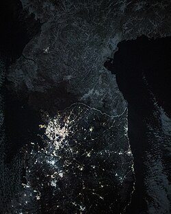 The division in 2024 is clearly visible from space with a higher amount of light emitted into space from the South than the North