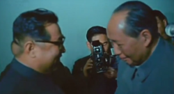 Kim's tumor is noticeable on the back of his head in this rare newsreel still image during a diplomatic meeting between him and Chinese Communist Party Chairman Mao Zedong in Beijing, 1970.
