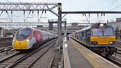 Virgin Trains Class 390 (left) and Caledonian Sleeper Class 92 (right)