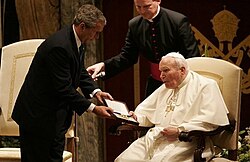 Pope John Paul II, given the Presidential Medal of Freedom by US President George W. Bush in 2004