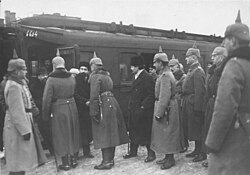 Trotsky being greeted by German officers