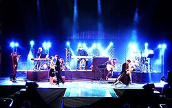 Tanghetto performing live at the Milano Forum Assago with guest tango dancers on stage (Latinoamericando Expo 2013, Milan, Italy).