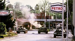 Slovenian Territorial Defense Units counterattacking a Yugoslav People's Army tank which entered Slovenia during the Ten-Day War, 1991