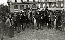 A Chaplin impersonator and his audience in San Sebastián, Spain, in 1919