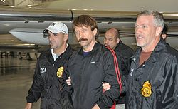 Viktor Bout in the custody of DEA agents on November 16, 2010, after being extradited to the United States