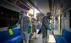 Disinfection of Tehran Metro trains to prevent COVID-19 transmission. Similar measures have also been taken in other countries.[295]