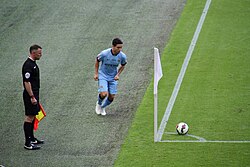 Nasri taking a corner-kick during the 2014 FA Community Shield against Arsenal